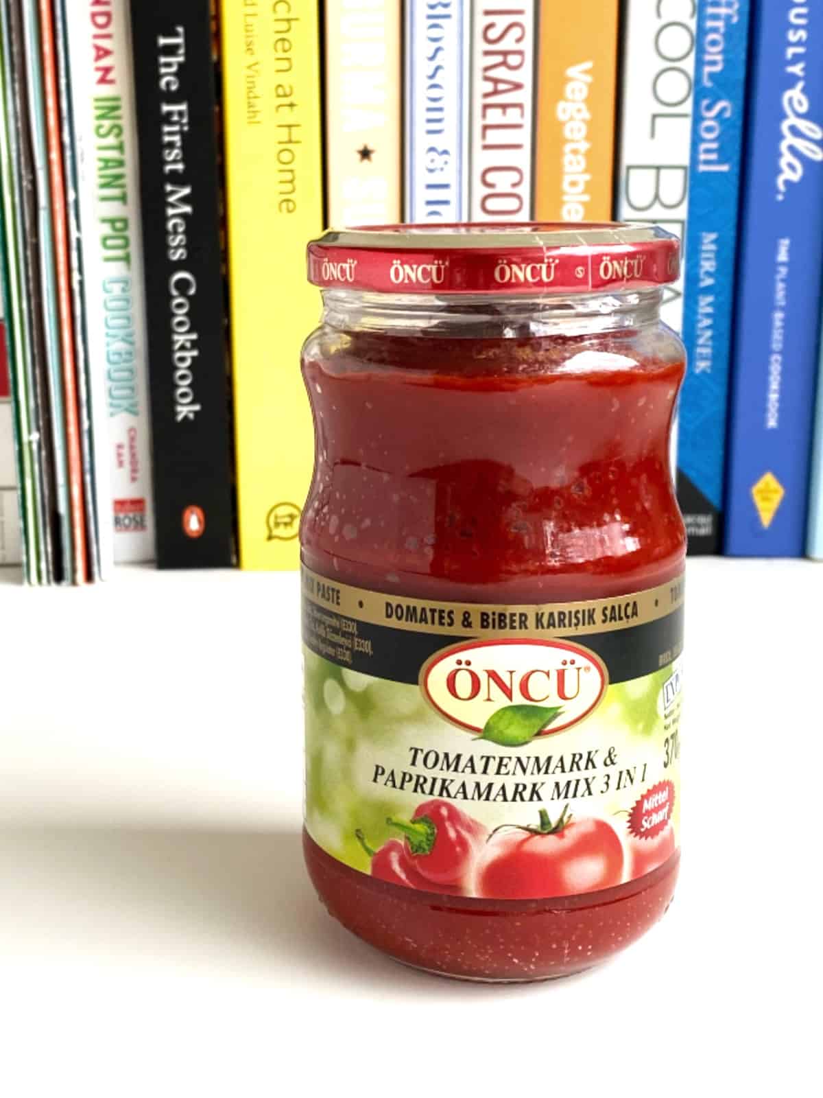 A photo of a glass jar of Turkish Tomato and Pepper Paste.