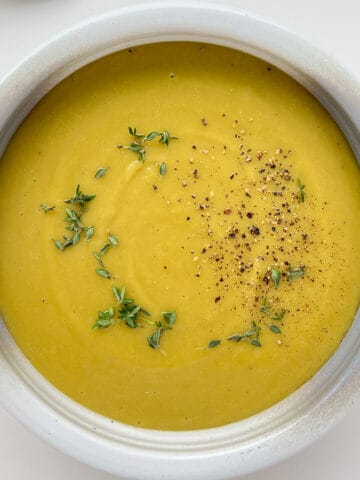 A close up image of a bowl of Smoky Herbed Split Pea Soup.
