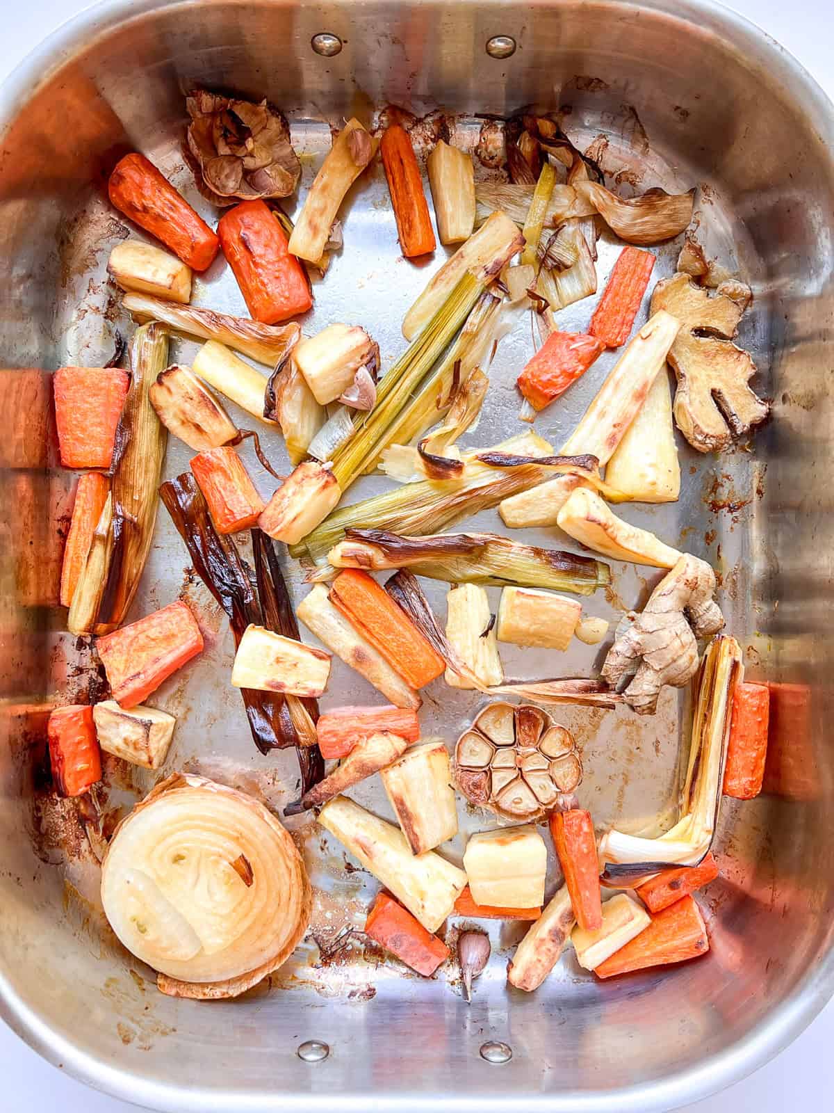 The vegetables used in the stock after roasting.