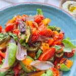 An image of Spiced Roasted Vegetables on a turquoise ceramic dish.