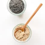 An image of small glass containers filled with Roasted Sesame Seed Salt made with white and black sesame seeds.