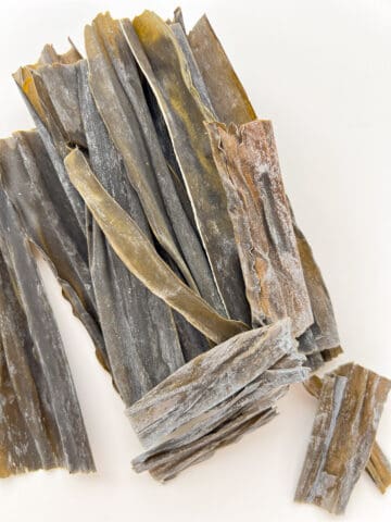 An image of dried kombu in its whole or stick form.