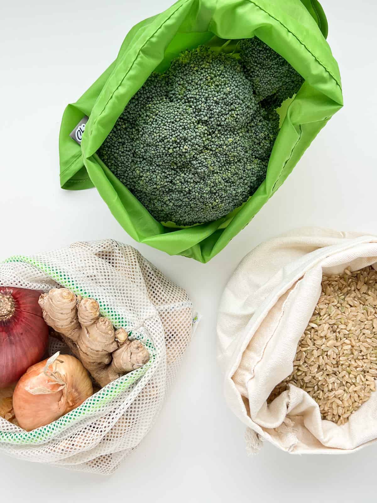 An image of different types of resuable bags for a lower waste kitchen.