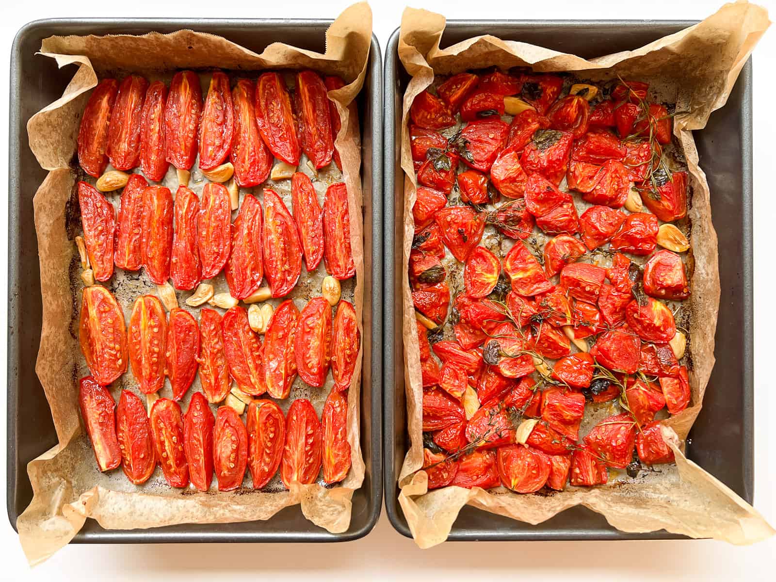 An image of two trays of tomatoes after being roasted.