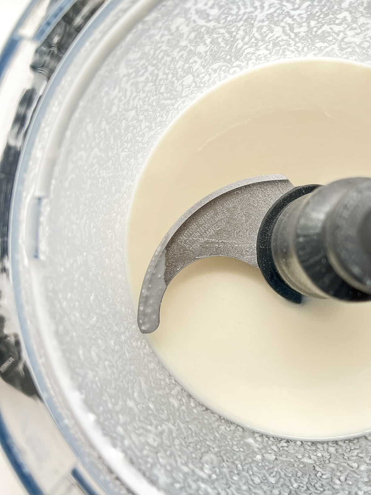 An image of coconut butter in its liquid state after it has been processed.