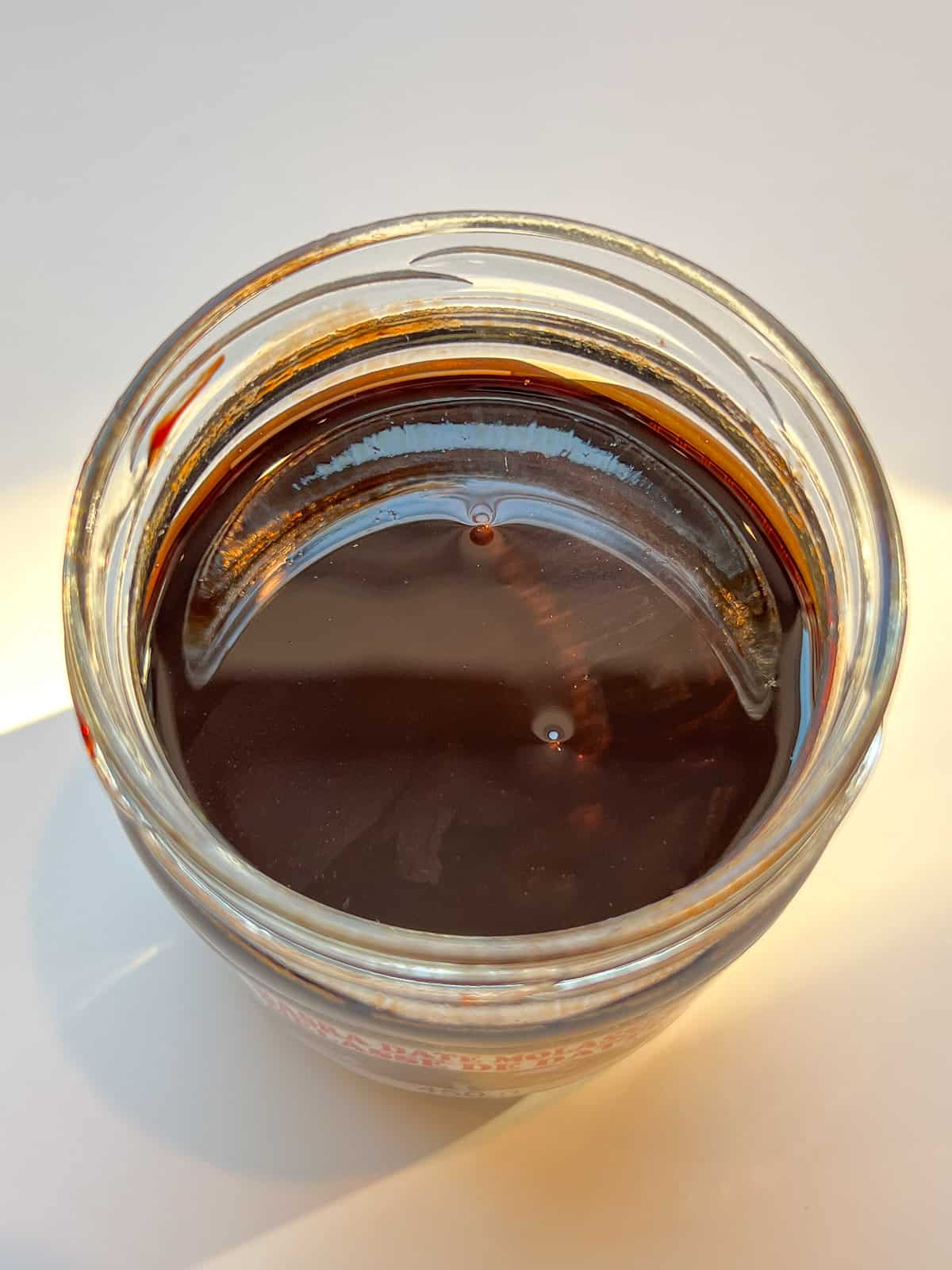 Date syrup in a jar.