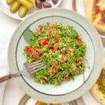An image of tabbouleh and other meze dishes.