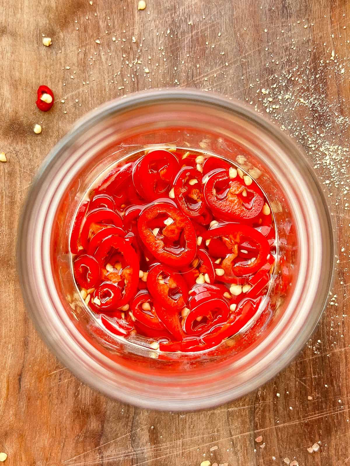 An image of a jar of pickled hot peppers.