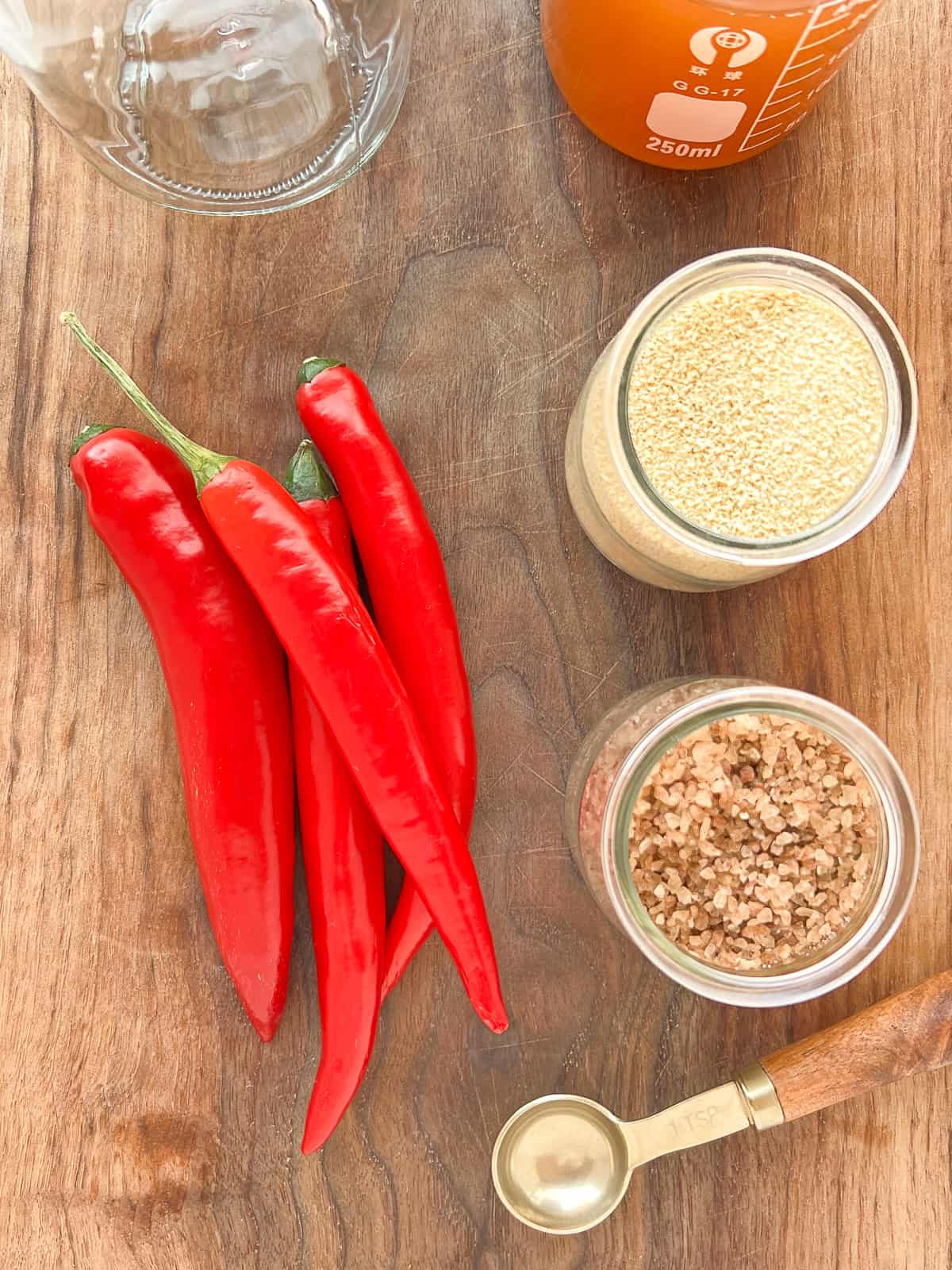 An image of the ingredients needs to make pickled hot peppers.