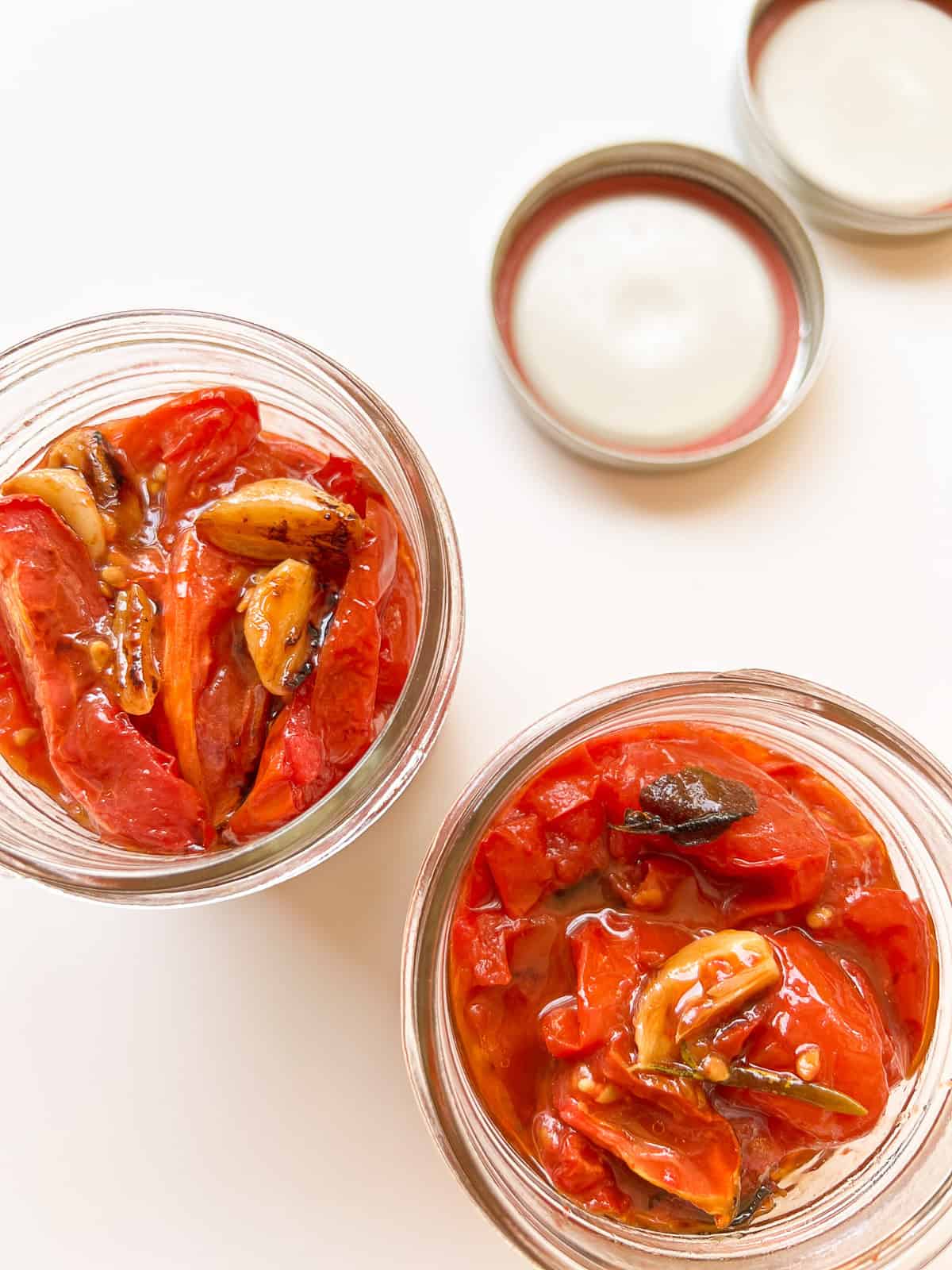 Two jars of Oven Roasted Tomatoes before being frozen.